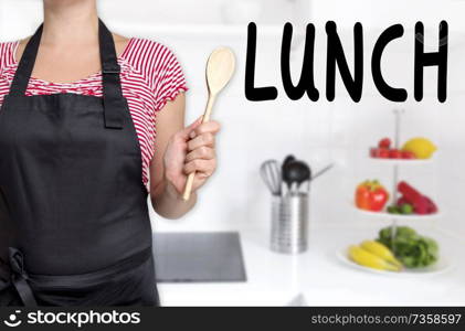 Lunch cook holding wooden spoon background.. Lunch cook holding wooden spoon background