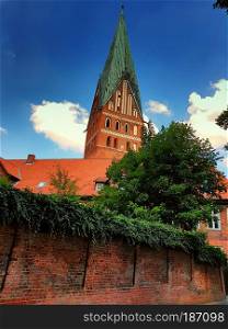 Luneburg, Germany, Dom and old historic houses with blue sky and clouds in the background