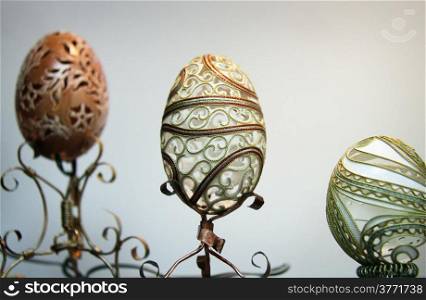 LUTSK - APRIL 14, 2014: Beautifully carved eggs in a museum. Shallow depth of field.