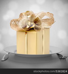 Luxurious gift on plate. Feast concept.