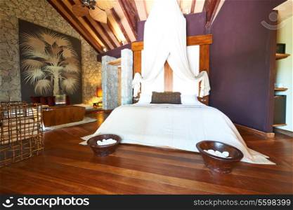 Luxurious hotel room interior with king size bed