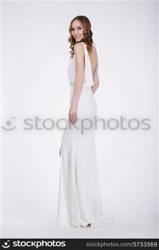 Luxurious Woman in Long Dress Posing