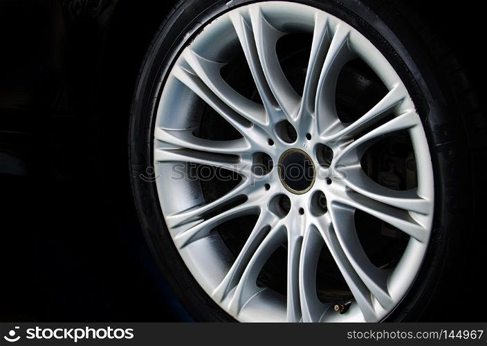 Luxury alloy wheel in close-up as an automotive