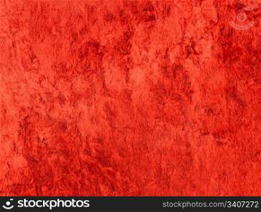 Luxury background of red velvet texture closeup