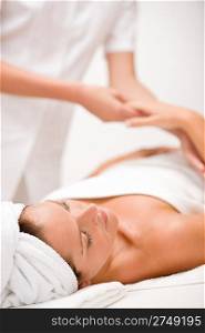 Luxury care - woman at massage in spa center