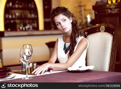 Luxury. Classy Romantic Woman in Restaurant. Expectancy