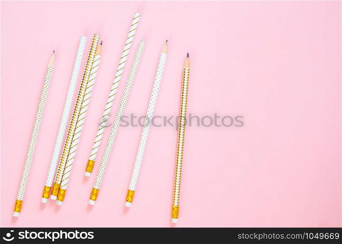 Luxury design pencil on pink pastel colour background