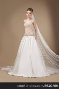 Luxury. Elegant Classy Brunette in Ivory Light Dress