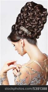 Luxury. Fashion Model with Trendy Updo - Braided Tress. Vogue Style