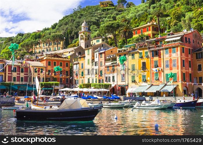 Luxury Italian holidays - scenic Portofino town in Liguria with colourful houses and sail boats. Italy ,may2013