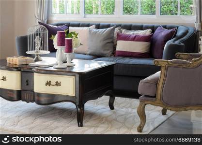 luxury living room design with classic sofa, armchair and decorative set on wooden table