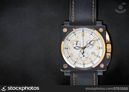 luxury man watch isolated against black background