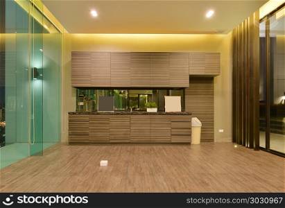 luxury modern kitchen area and decoration at night on condominiu. luxury modern kitchen area and decoration at night on condominium, interior design. luxury modern kitchen area and decoration at night on condominium, interior design