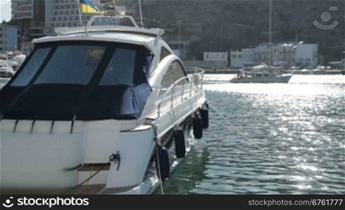 luxury motor yacht in a marina