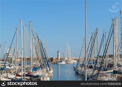 Luxury sail boats at pier in harbour