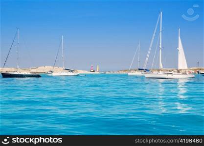 Luxury sailboats in turquoise beach of Formentera Illetes