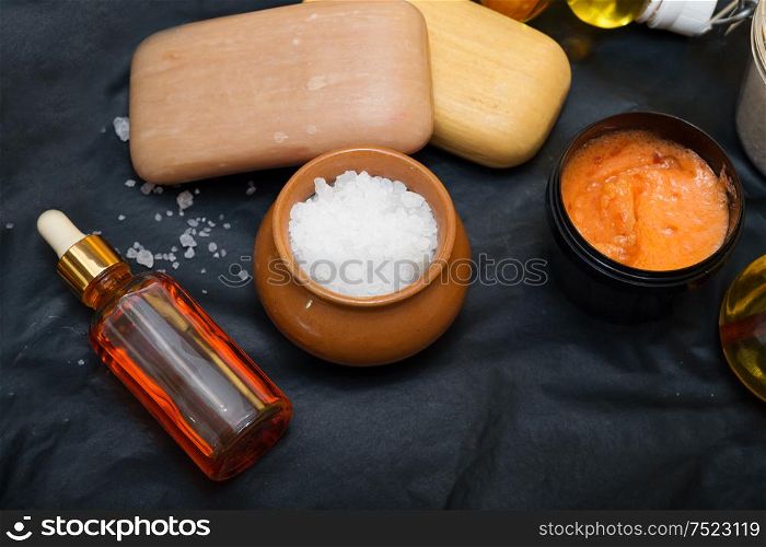 luxury Set of spa products with accessoires on black background. close up