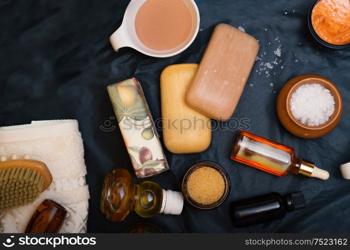 luxury Set of spa products with accessoires on black background. close up