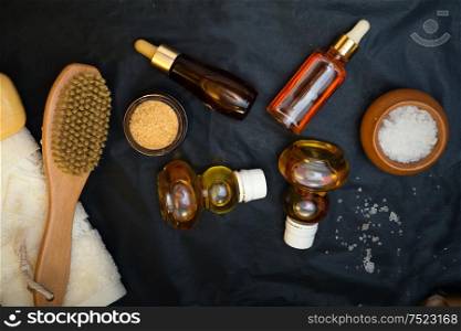 luxury Set of spa products with accessoires on black background. close up