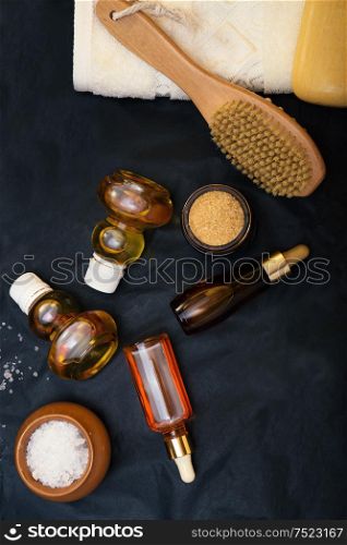 luxury Set of spa products with accessoires on black background. flat lay