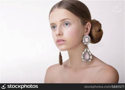 Luxury. Sophisticated Woman with Pearly Earrings with Diamonds