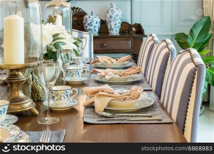 luxury table set in classic style dining room interior
