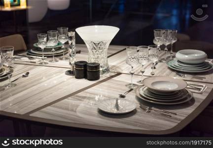 Luxury Table Setting with Crystal Glass and Expensive Tableware