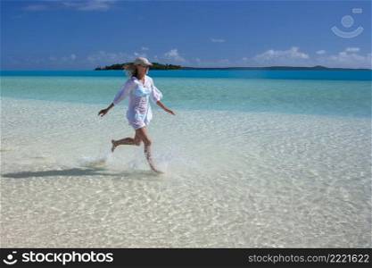 Luxury vacation at a tropical lagoon on a small island in Aitutaki Lagoon in the Cook Islands in the South Pacific.