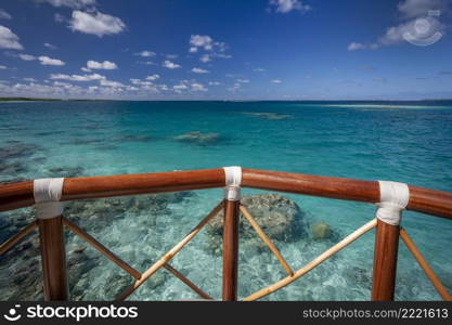 Luxury Vacation - View from luxury accommodation over a tropical lagoon in the Cook Islands in the South Pacific Ocean.