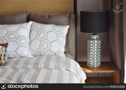 luxury white lamp on wooden table in bedroom at home