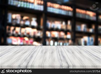 Luxury white wooden table top with blurred coffee shop background. product display template