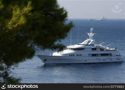 Luxury yacht entering small port,Greece