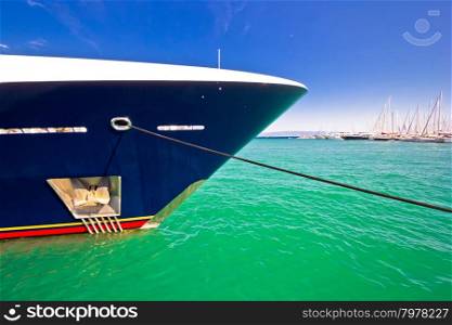 Luxury yacht prow and anchor view on colorful sea