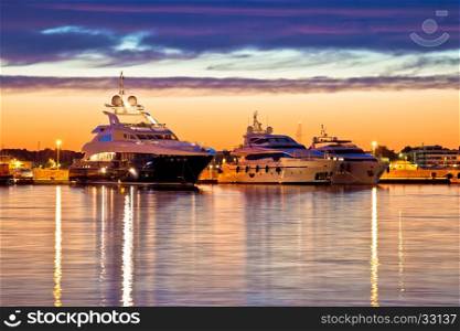 Luxury yachts harbor at golden hour view, Zadar, Croatia, Dalmatia