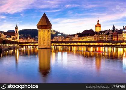Luzern Kapelbrucke and riverfront architecture famous Swiss landmarks view, famous landmarks of Switzerland
