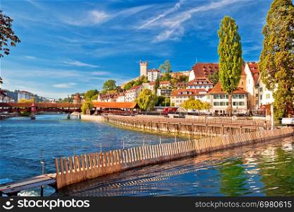 Luzern Reuss river waterfront landmarks view, town in central Switzerland