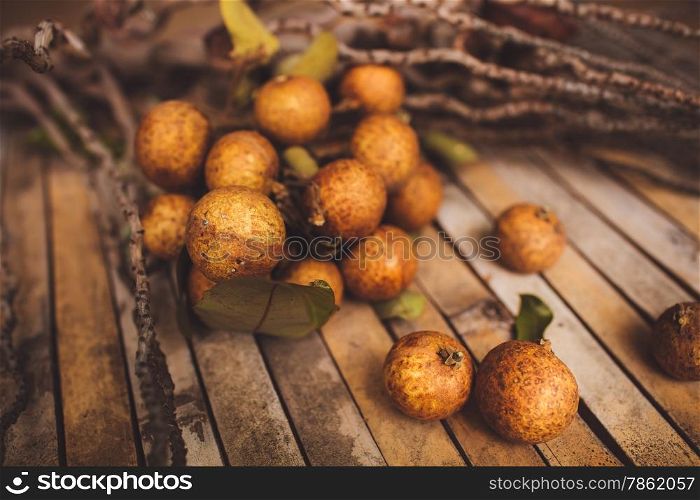 lychee - Litchi chinensis closeup on brown board background