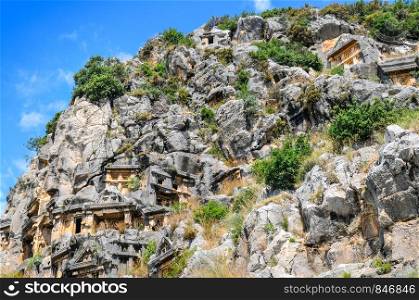 Lycian rock-cut tombs in Myra, Turkey . The concept is travel.