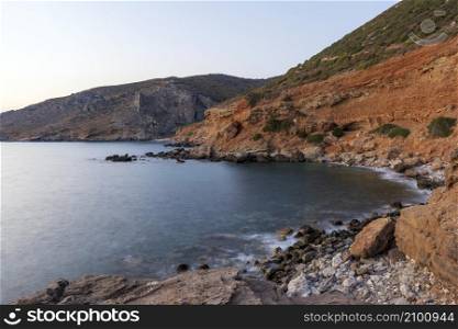 Lycodimou rocky beach with turquoise waters in Kythera island at summer, Greece.. Lycodimou rocky beach with turquoise waters in Kythera island at summer in Greece