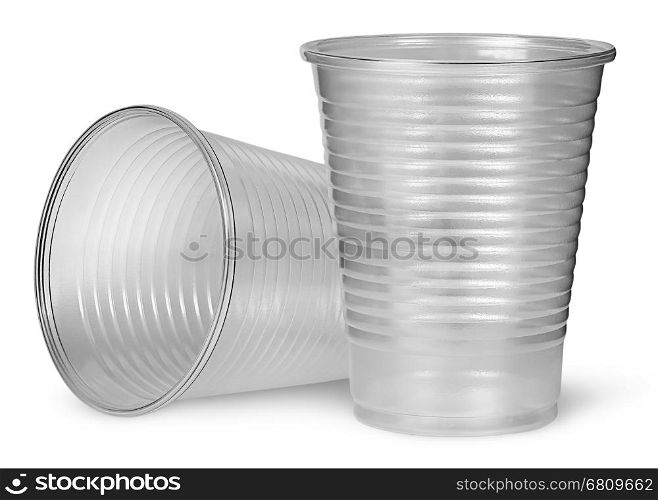 Lying and standing plastic cups isolated on white background