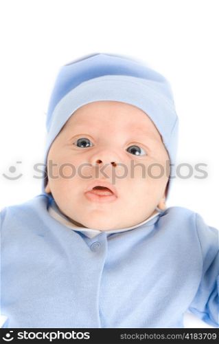 Lying baby boy at blue on a white background
