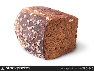 Lying half unleavened black bread with seeds and dried fruit isolated on white background