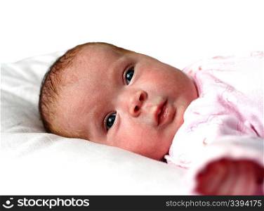 lying newborn baby girl close-up portrait