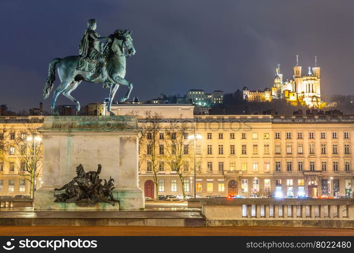 Lyon Place Bellecour statue of King Louis XIV at night France