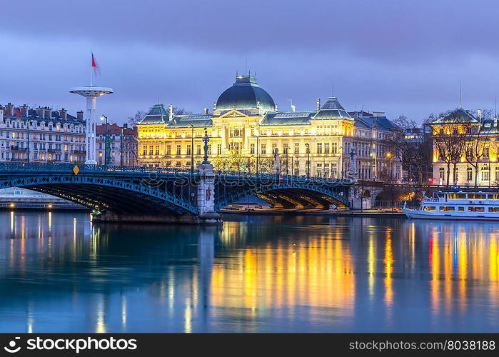 Lyon University bridge along Rhone river at night in Lyon France