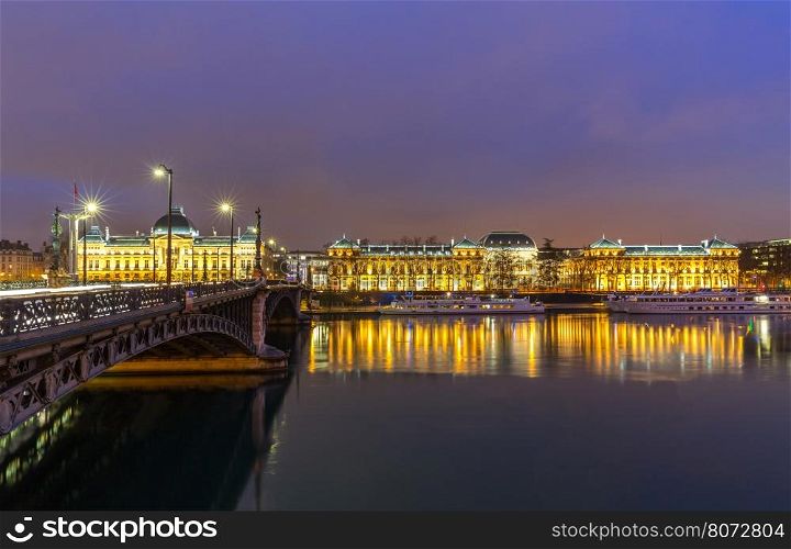 Lyon University bridge along Rhone river at night in Lyon France