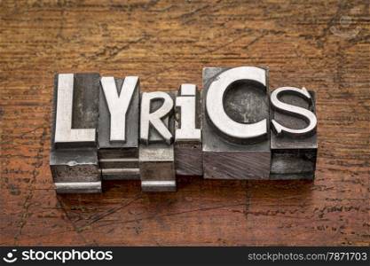 lyrics word in mixed vintage metal type printing blocks over grunge wood