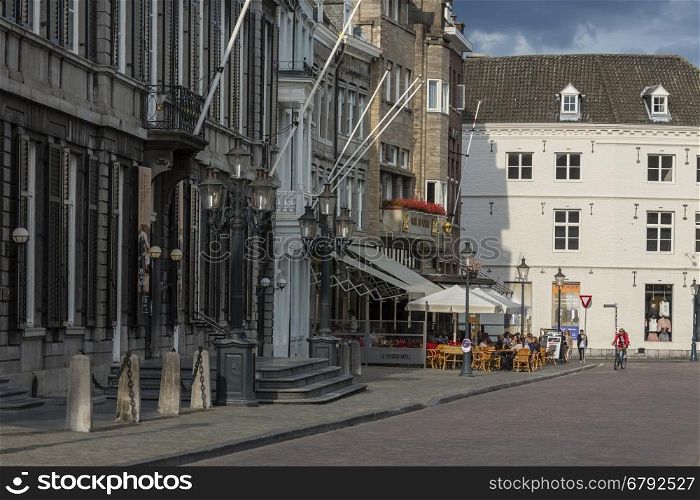 Maastricht in the southeast of the Netherlands. The city center and a corner of Vrijthof Square. Maastricht is an industrial city, capital of the province of Limburg, and is situated on the River Maas near the Belgian and German borders;