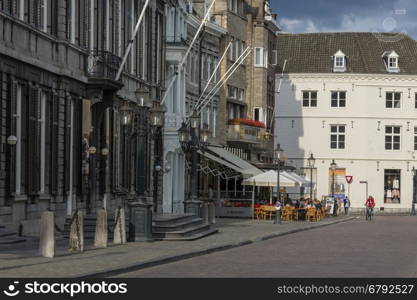 Maastricht in the southeast of the Netherlands. The city center and a corner of Vrijthof Square. Maastricht is an industrial city, capital of the province of Limburg, and is situated on the River Maas near the Belgian and German borders;