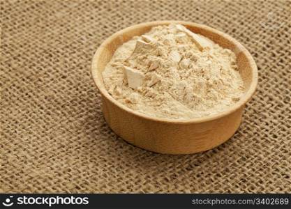 maca root powder (nutrition supplement - superfood from Andies) in a wood bowl
